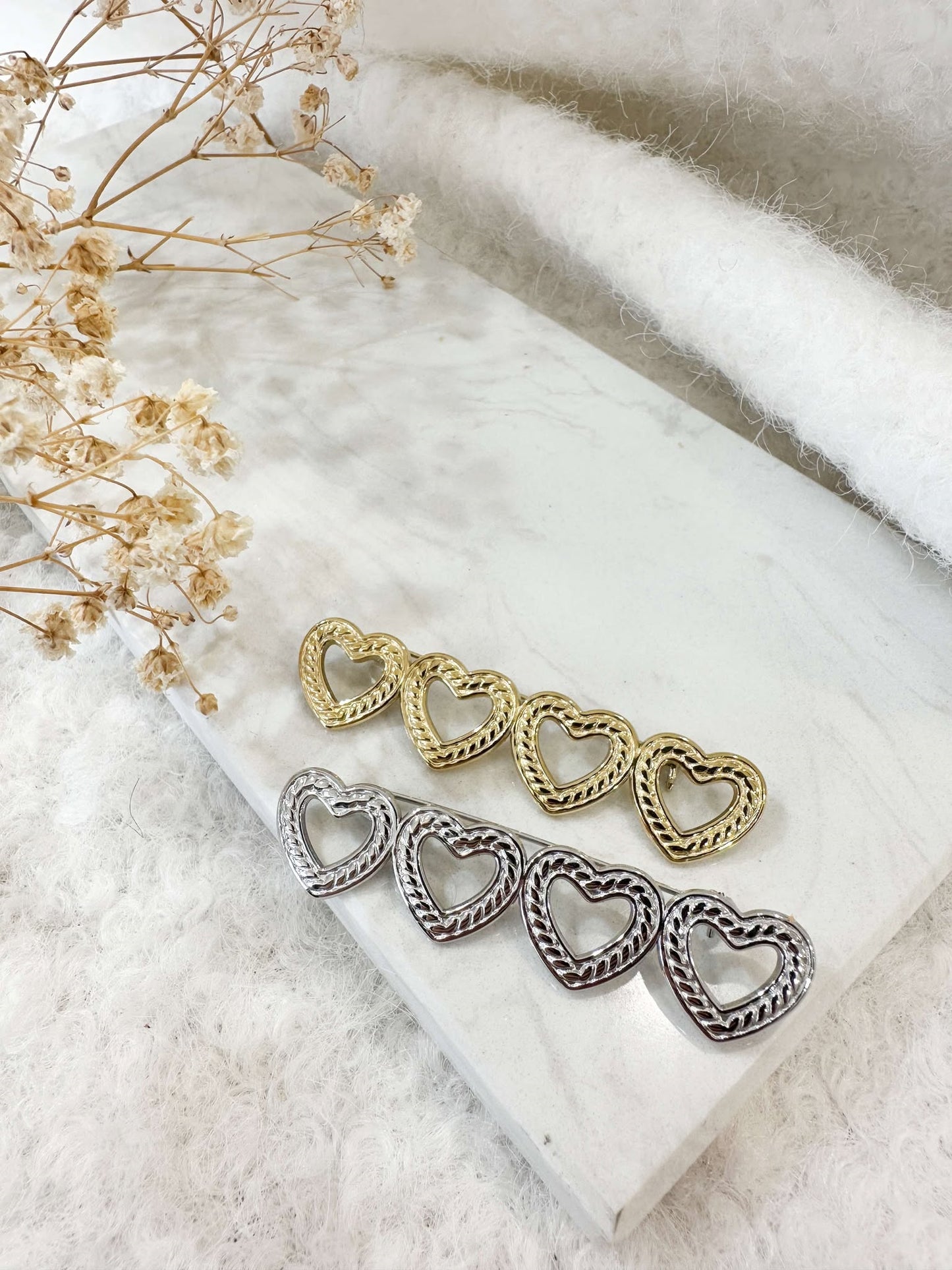 Broche coeur dorée