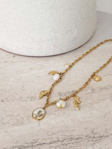 Collier à pampilles blanc et doré