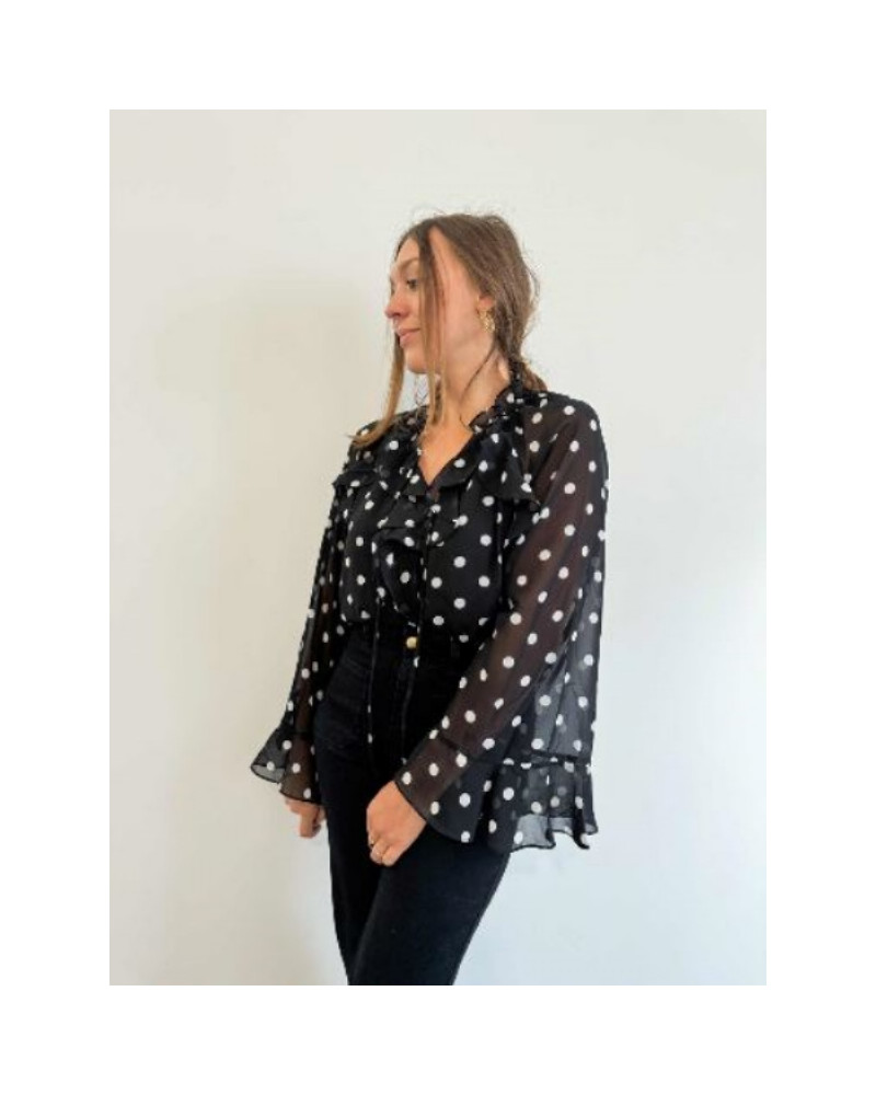 Blouse femme noire à pois blancs – Élégance intemporelle et style chic