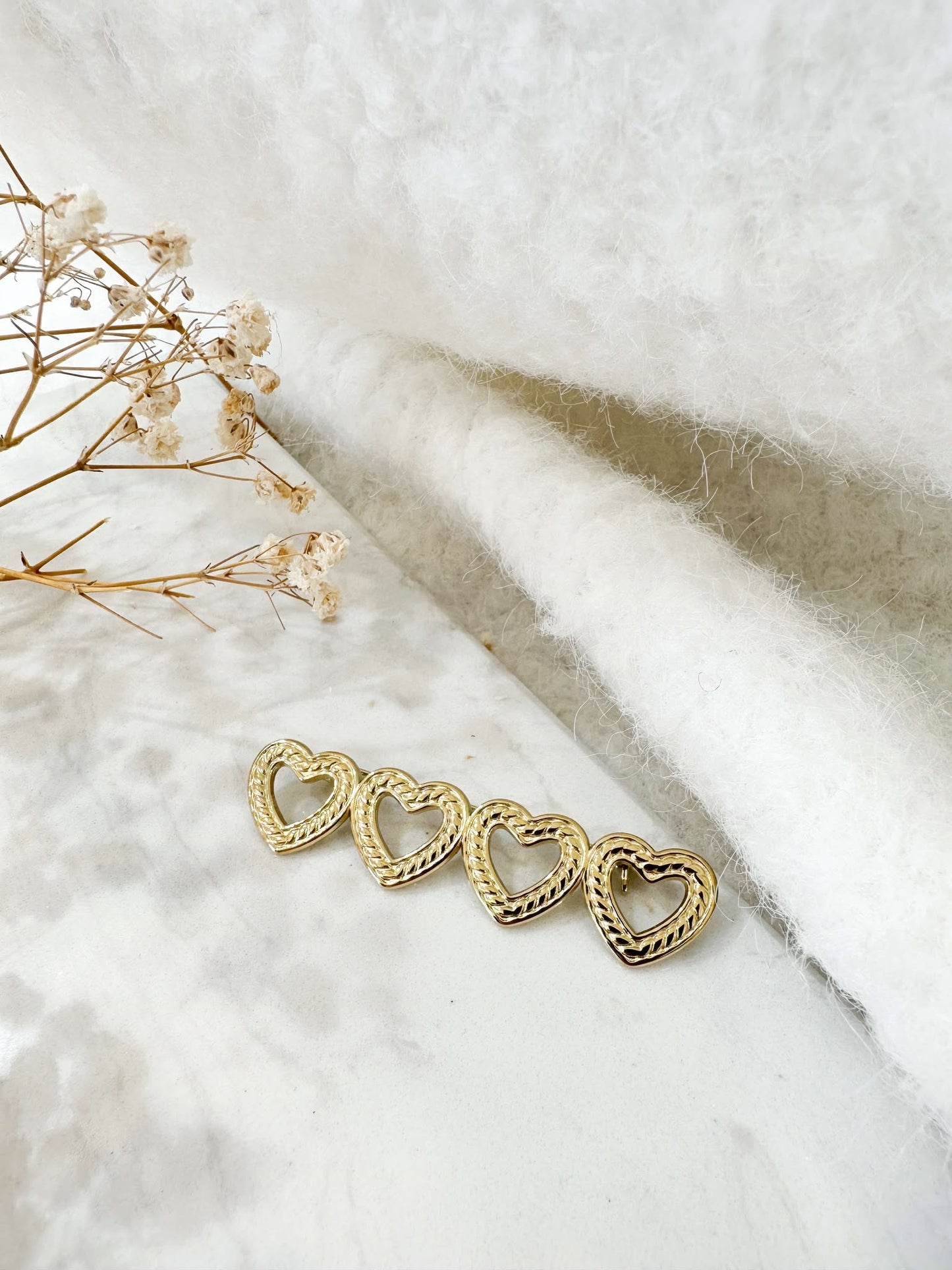 Broche coeur dorée
